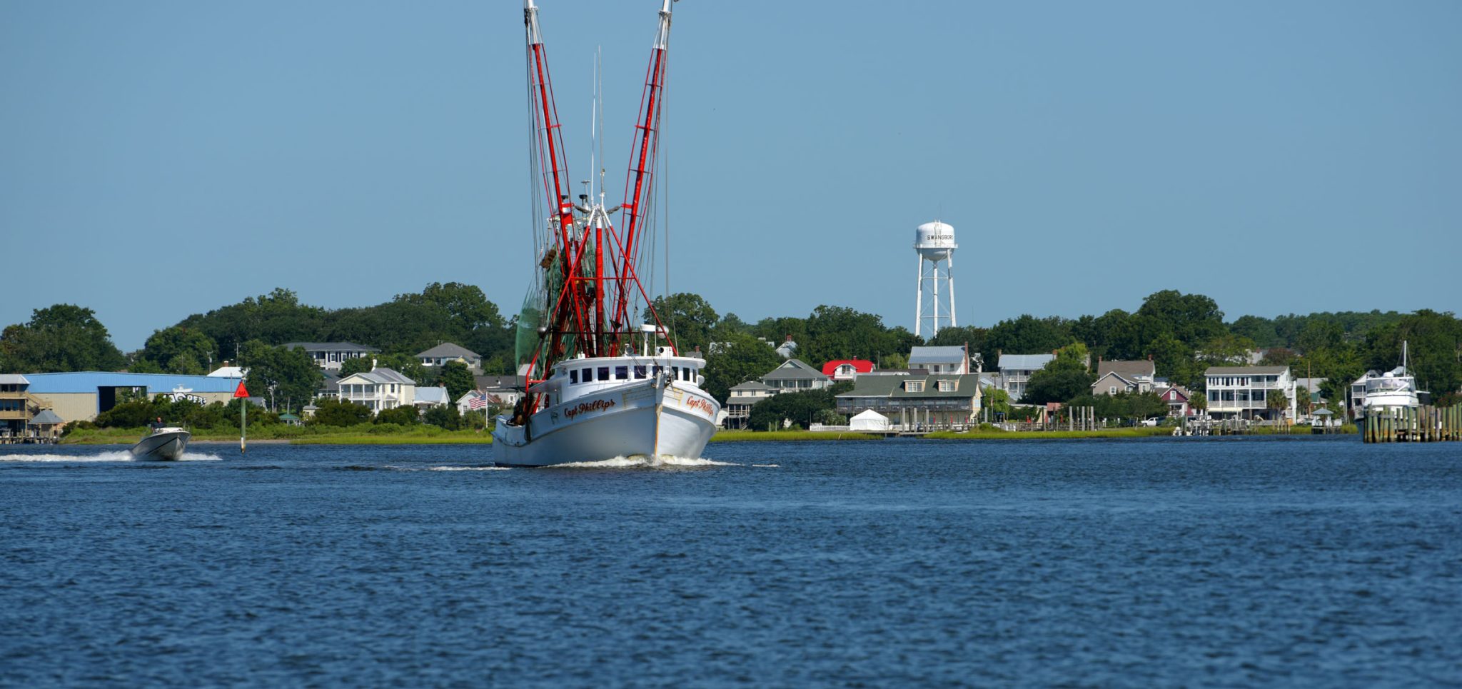 Swansboro waterfront with fishing boat Swansboro, NC