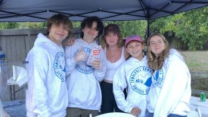 Teens working food booth