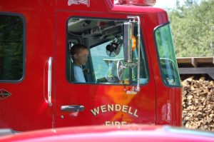 Wendell Kid in Wendell Fire Truck