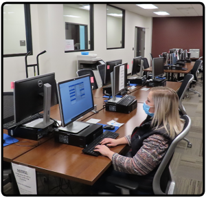 Girl at computer in Records Search Room