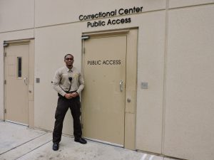 DSCN1694 Male Corrections Deputy outside of the Public Access door to the Correctional Center