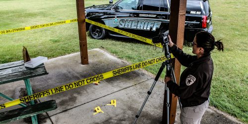 Female detective at a crime scene