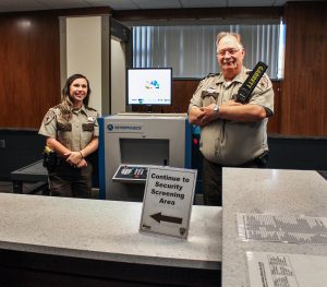 Female and male Courthouse Security Deputies in the security screening area