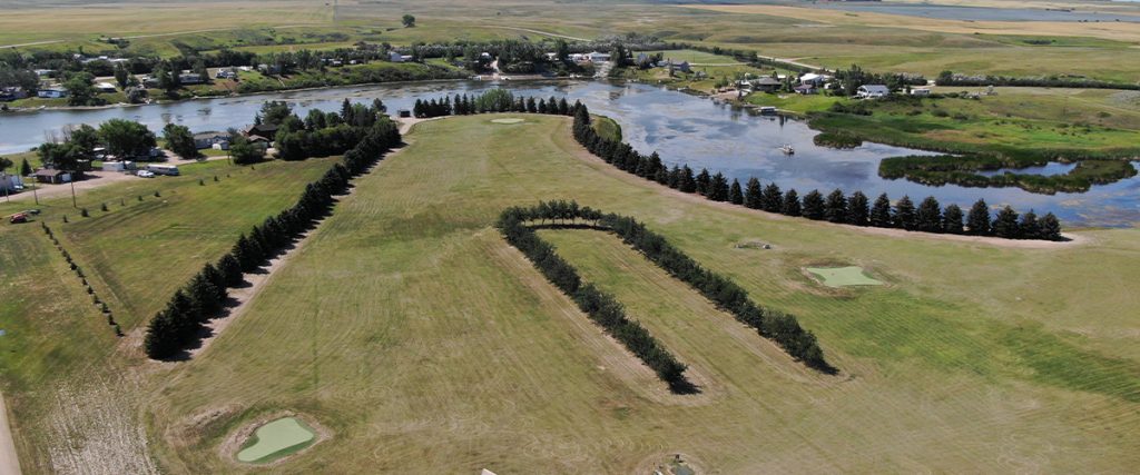 Aerial view of several holes of the Blacktail Dam Golf Course