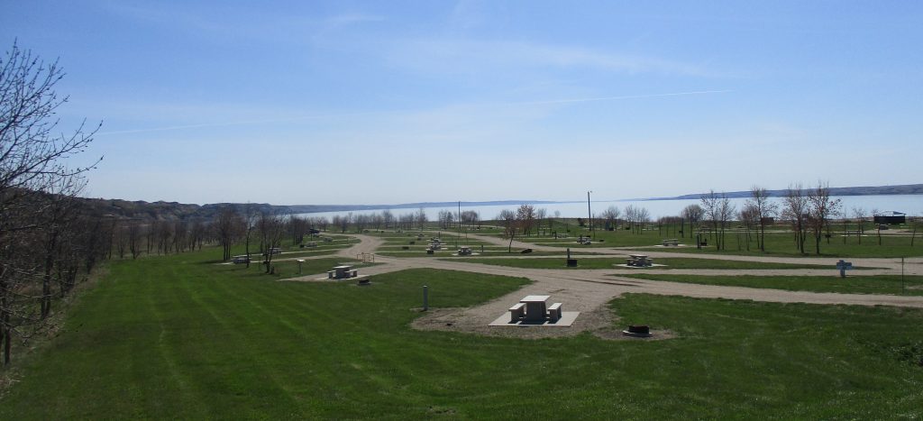 Scenic view of campsites and picnic tables