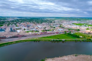 Aerial image of downtown Williston with a train track