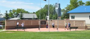 View of Veterans Memorial Wall with flags