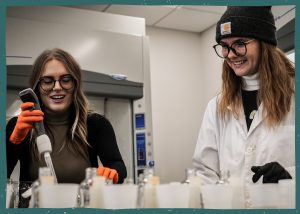 Girls in a lab with chemical samples