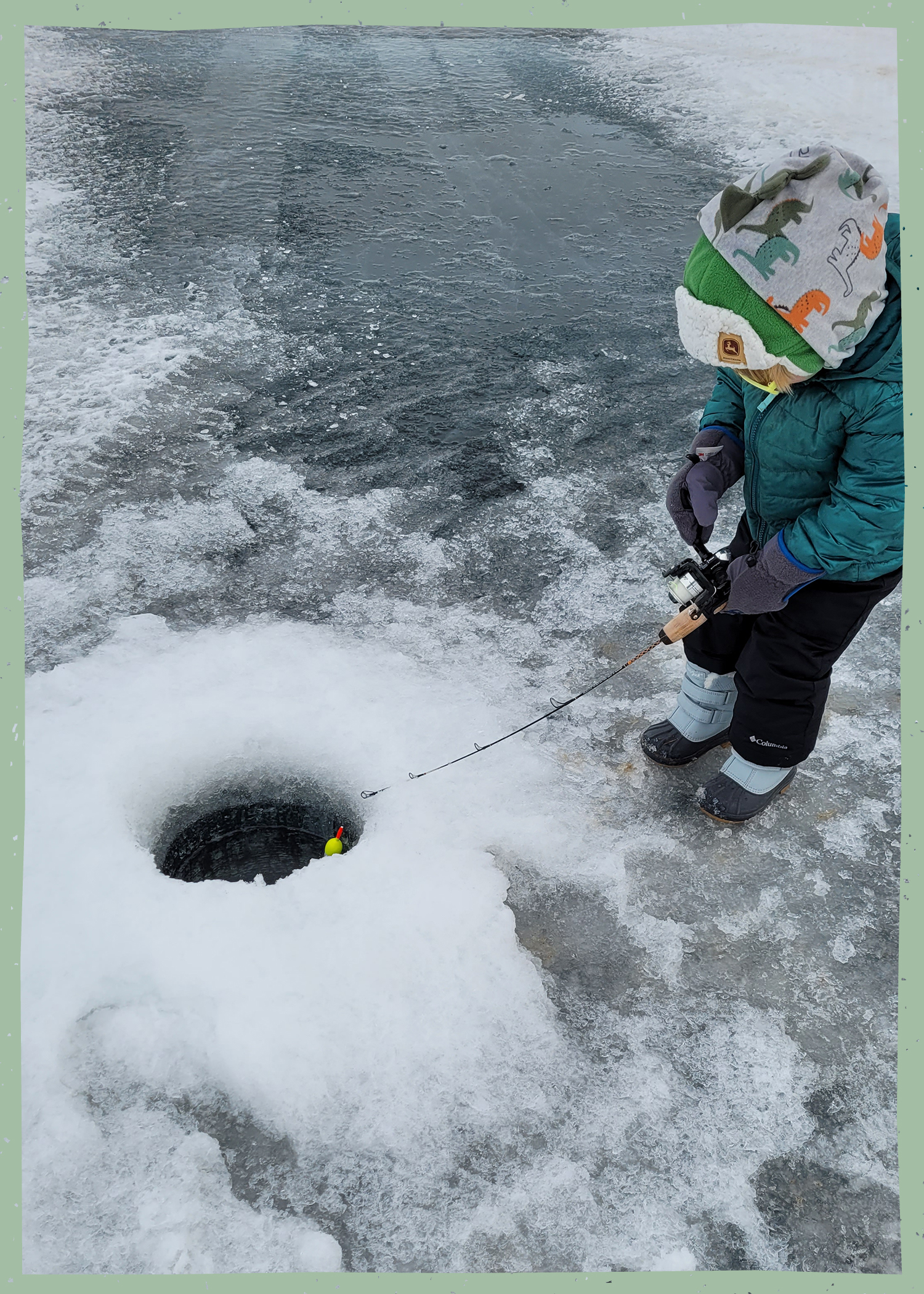 Boy ice fishing