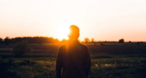 Young man facing sun 1024x683