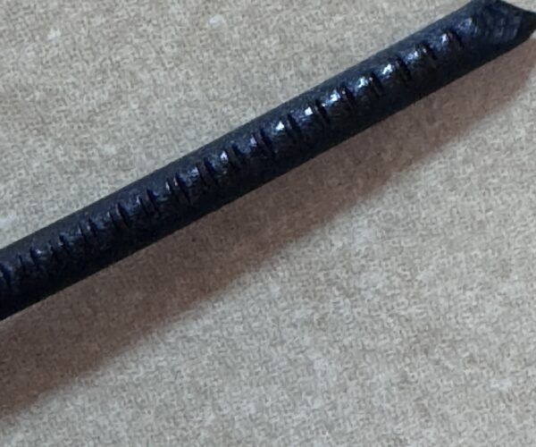 Filament after unloading showing gear marks