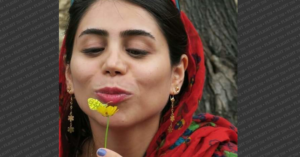 Ghanimat Azhdari with a flower