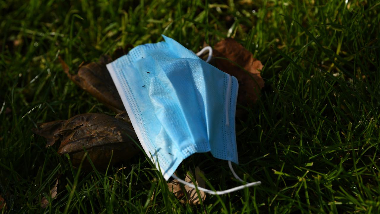 A discarded single use face mask (file image)