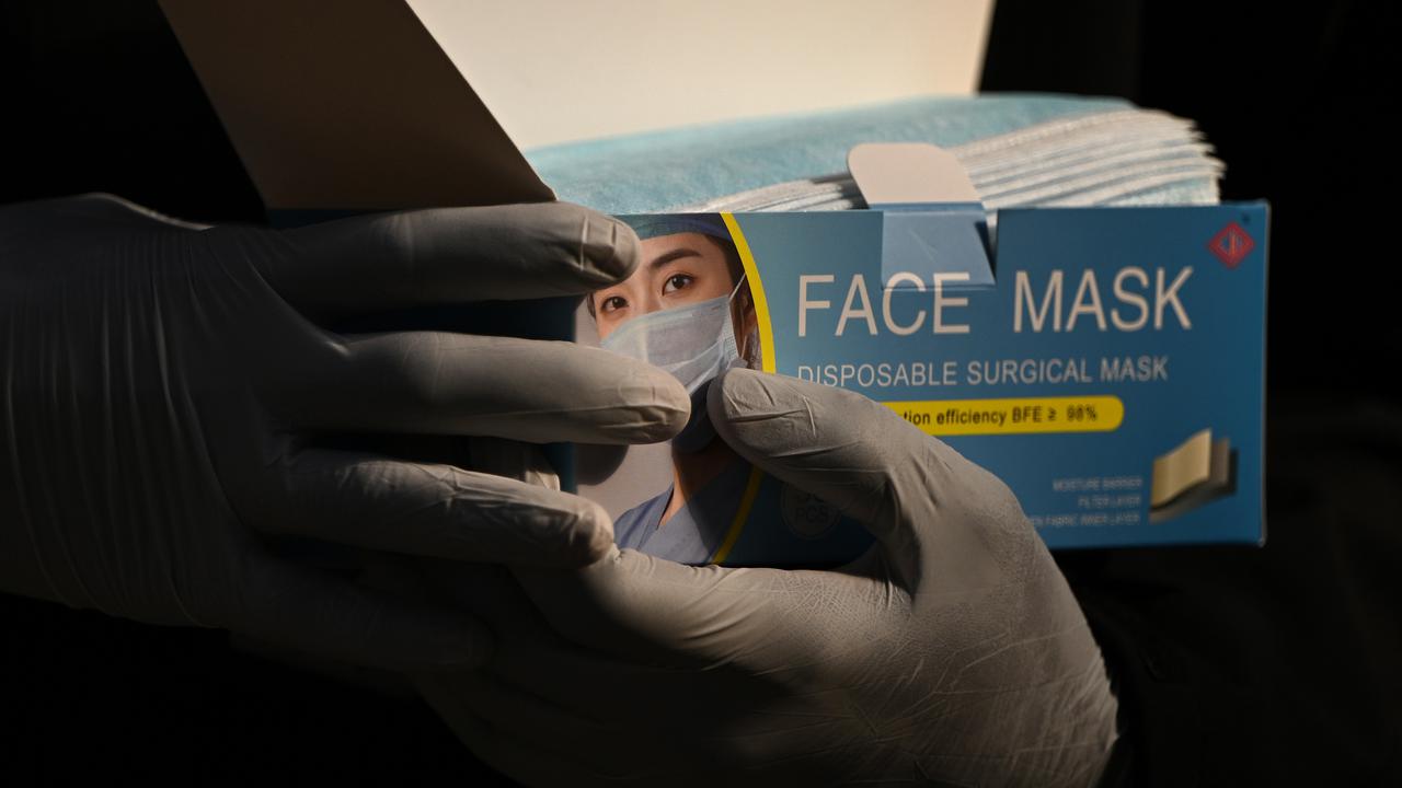 A box of surgical face masks (file image)