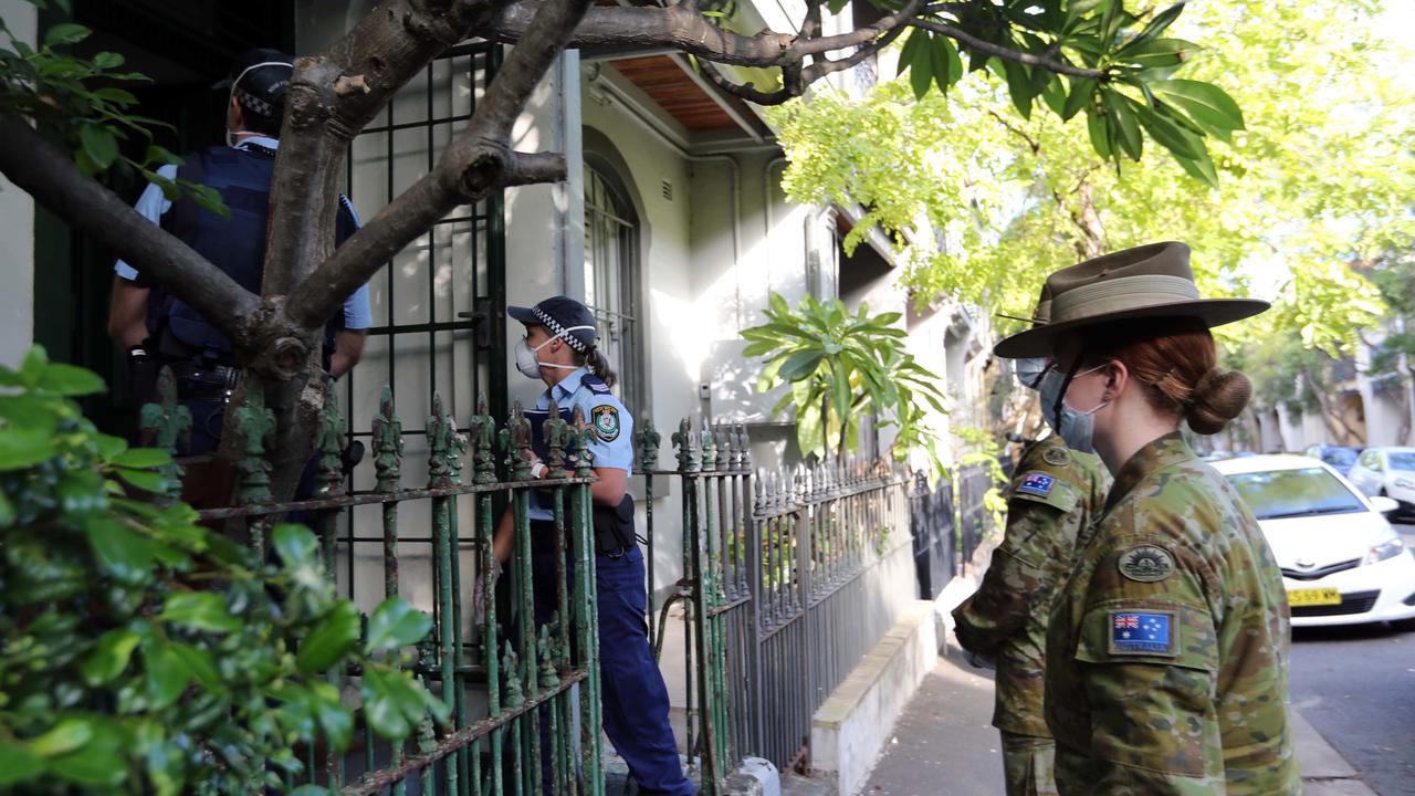 NSW Police and Australian Defence Force members conducting a check