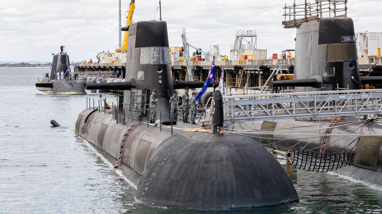An Australian Collins class submarine (front) at HMAS Stirling, Perth