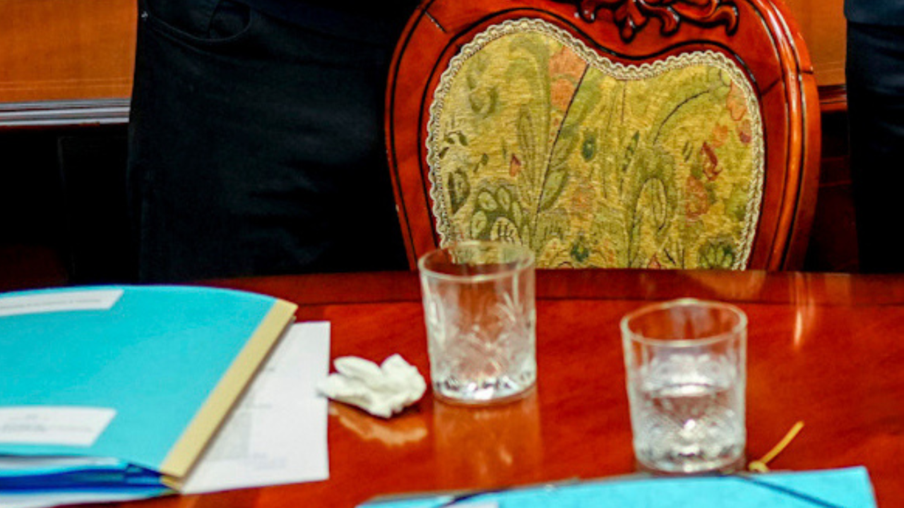 Close up of a tissue and drink stirrer.