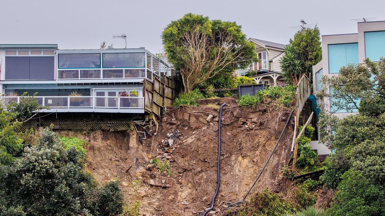 A landslip near a house in Auckland caused by Cyclone Gabrielle