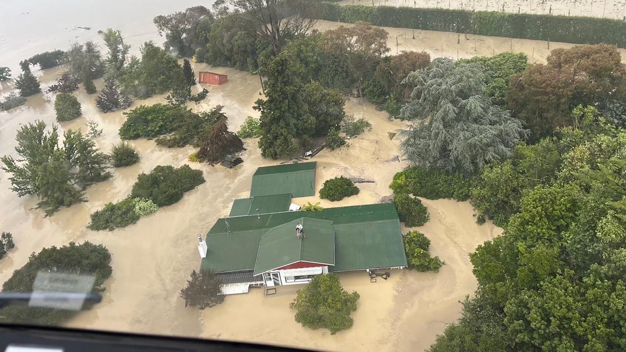 A helicopter recovers people from rooftops in Napier (file image)