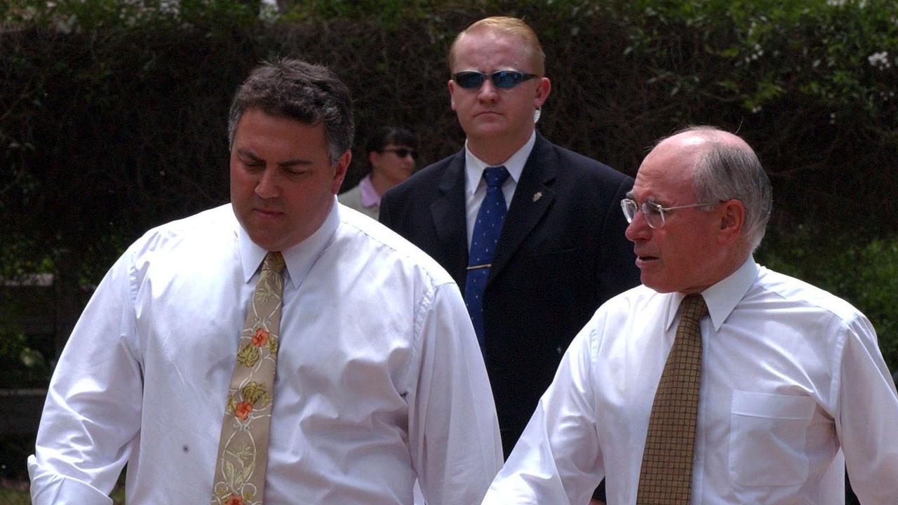 A photo of Joe Hockey with John Howard.