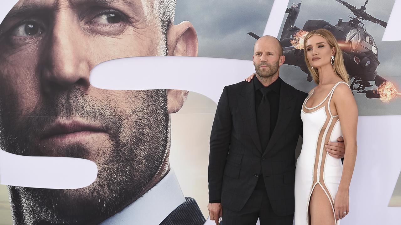 Jason Statham and Rosie Huntingon-Whitely at a film premiere.