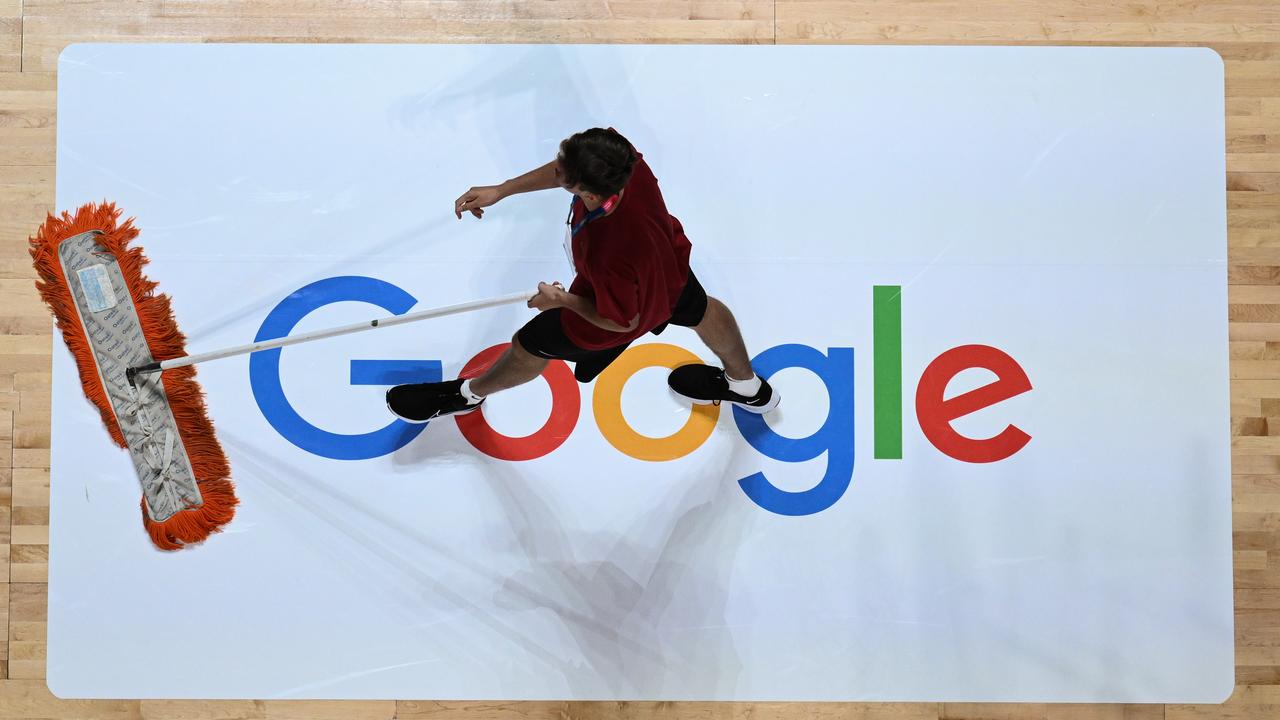 A photo of a Google logo at a basketball tournament.