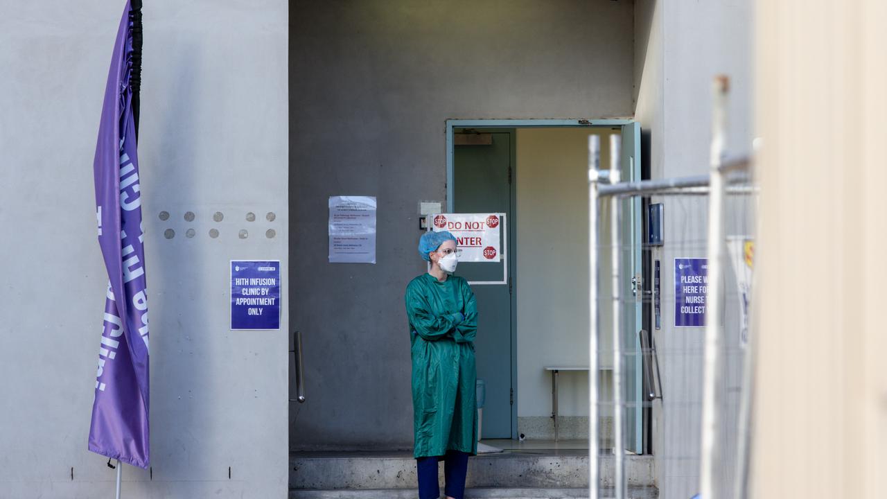 A nurse outside a hospital
