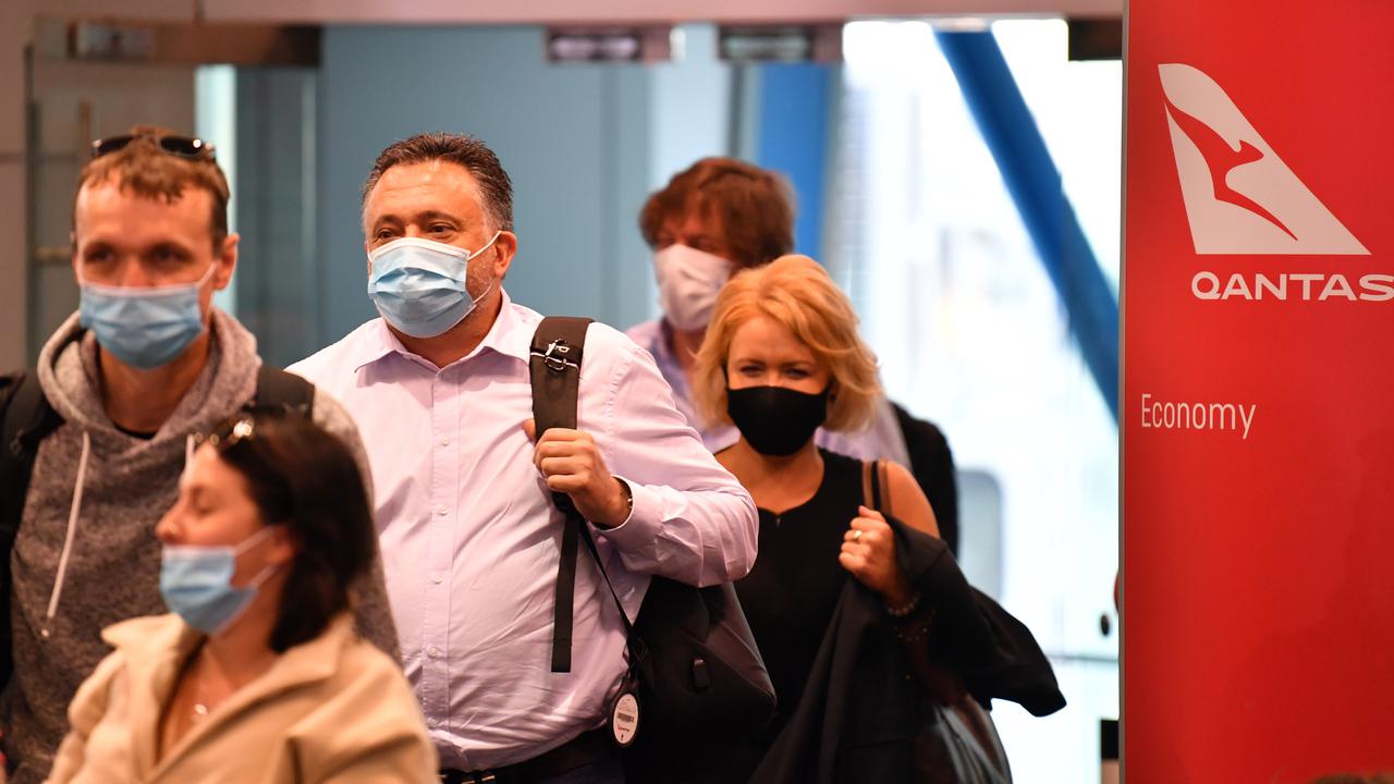 Passengers disembark a Qantas flight (file image)