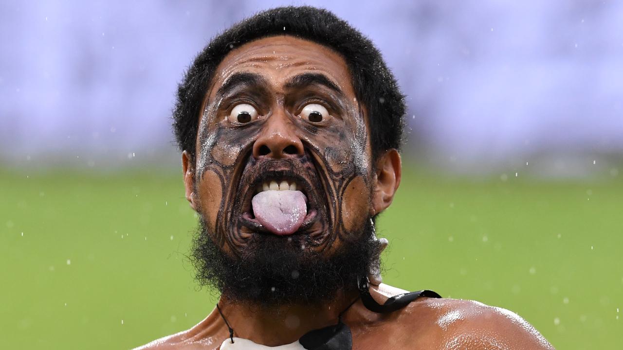 A Maori man performing a haka