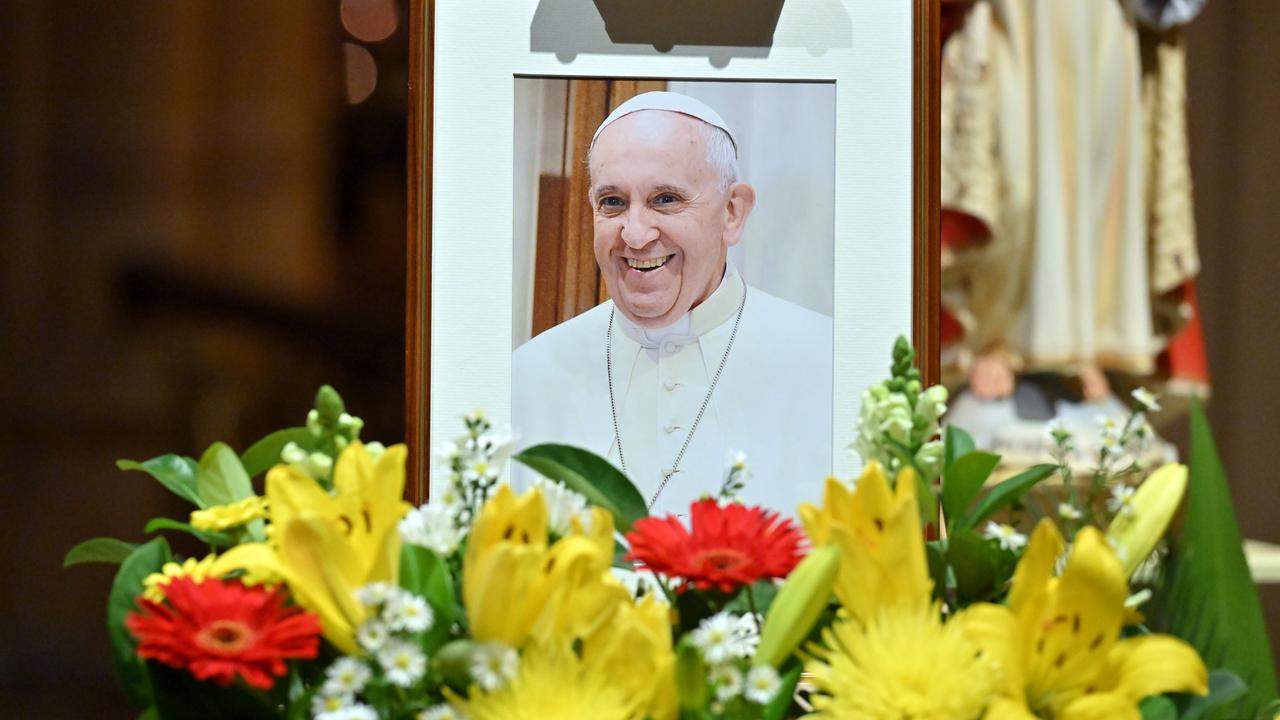 A portrait of Pope Francis at a mass in Sydney.