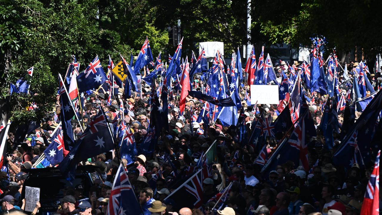 Marchers wave Australian flags at a recent anti-immigration protest.