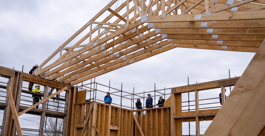 The North Atlantic States Carpenters Training Fund worked alongside our students to install the roof trusses at the Larkin Co