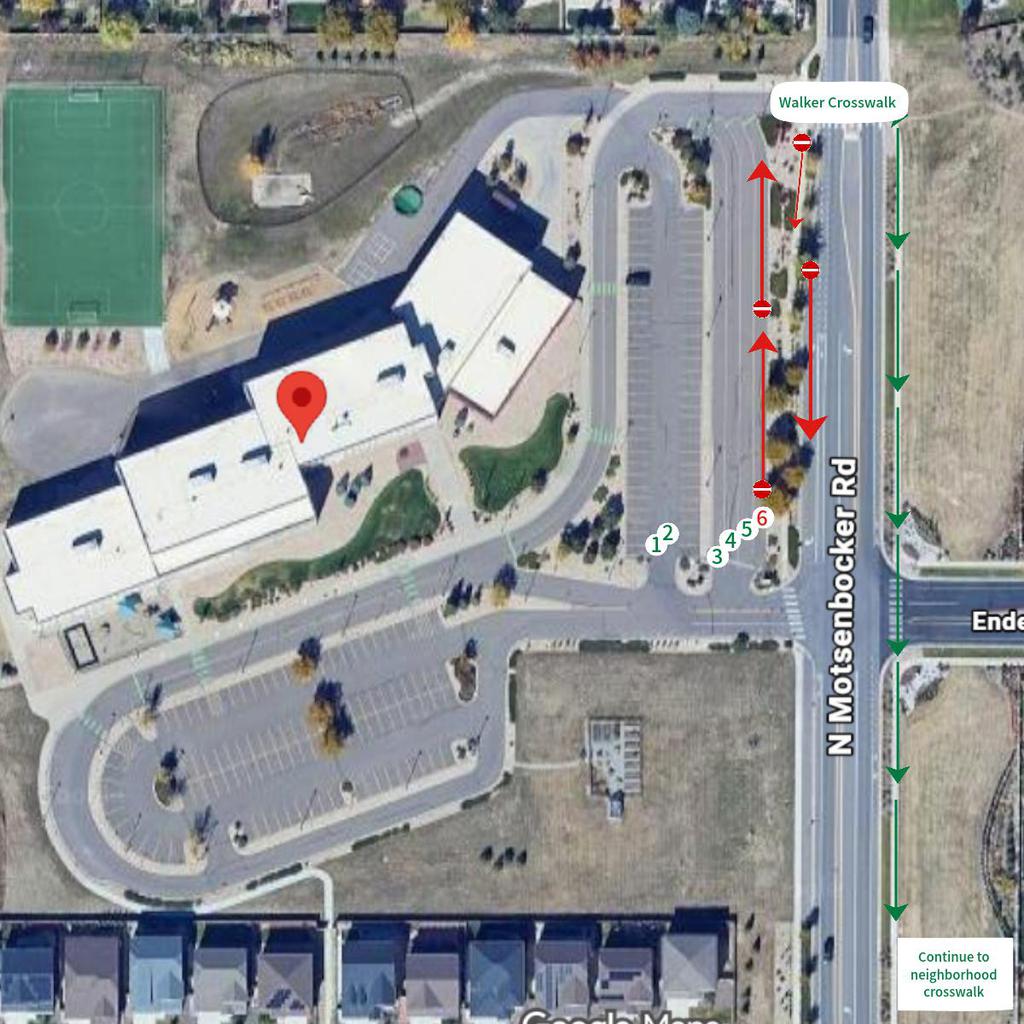 Image of MB campus showing closed sidewalk and carpool lane.