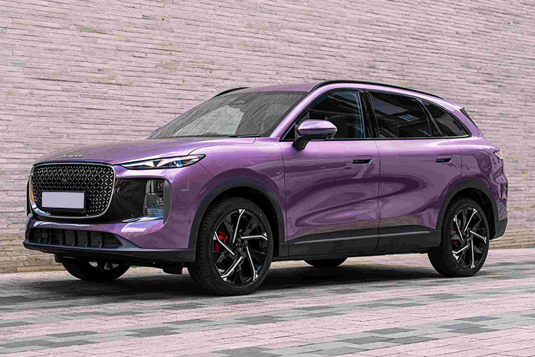 Purple Lepas L8 parked in front of a wall.