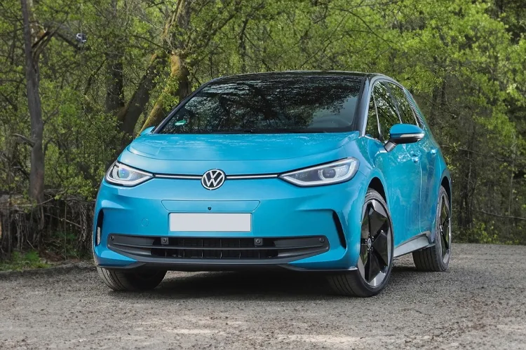 A blue Volkswagen parked on a country road.