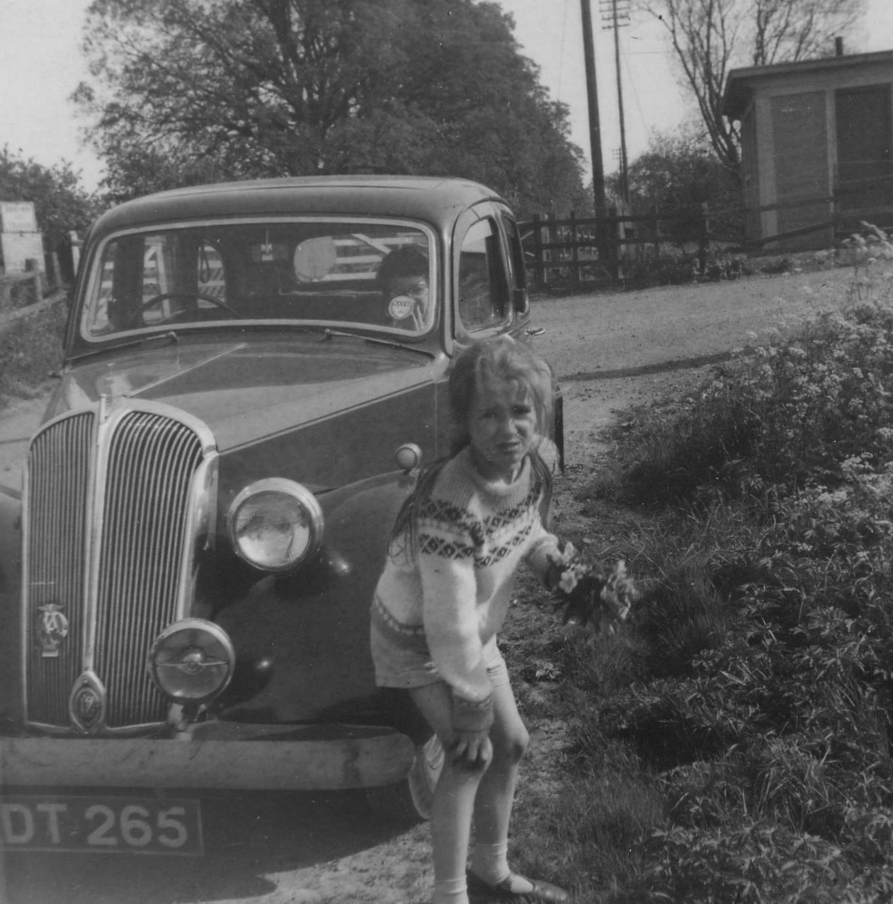 A very young Renee showing her discomfort among the nettles