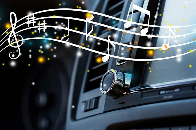 Musical notes being shown across a car's infotainment system to signify music is being played