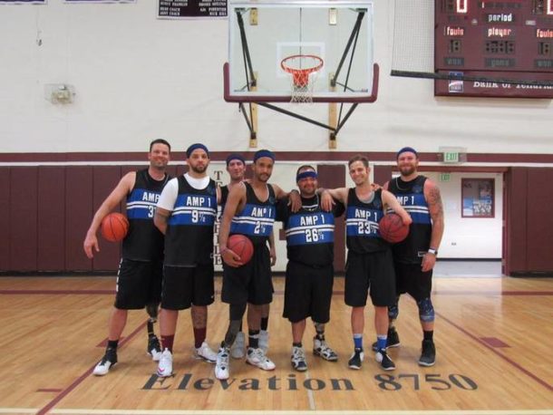 Photo of an amputee stand-up basketball team.