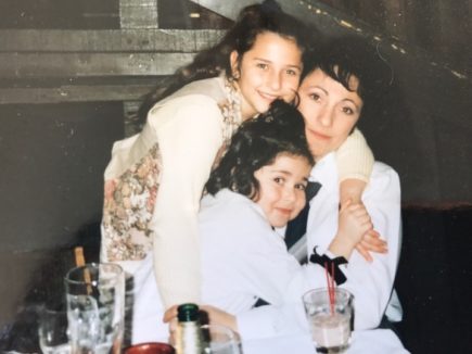 Natalie with her mom and sister