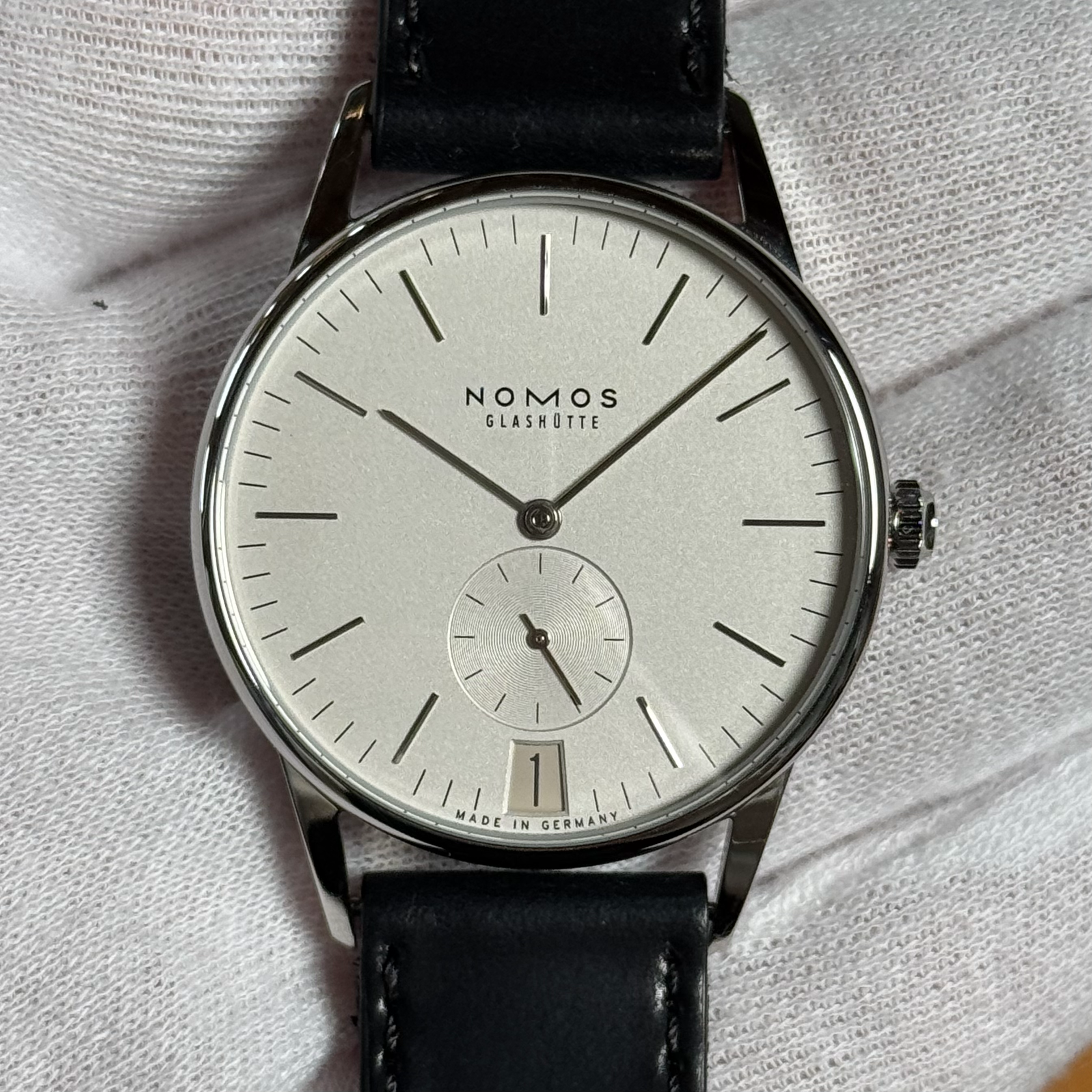 Auction: 2016 Nomos Glashütte Orion 38 Date White Open Case Back