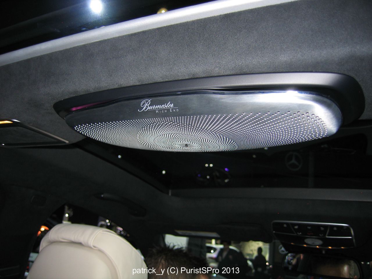 A Burmester Center Fill Speaker on the ceiling of the car. This is the first I've seen a speaker in the ceiling!