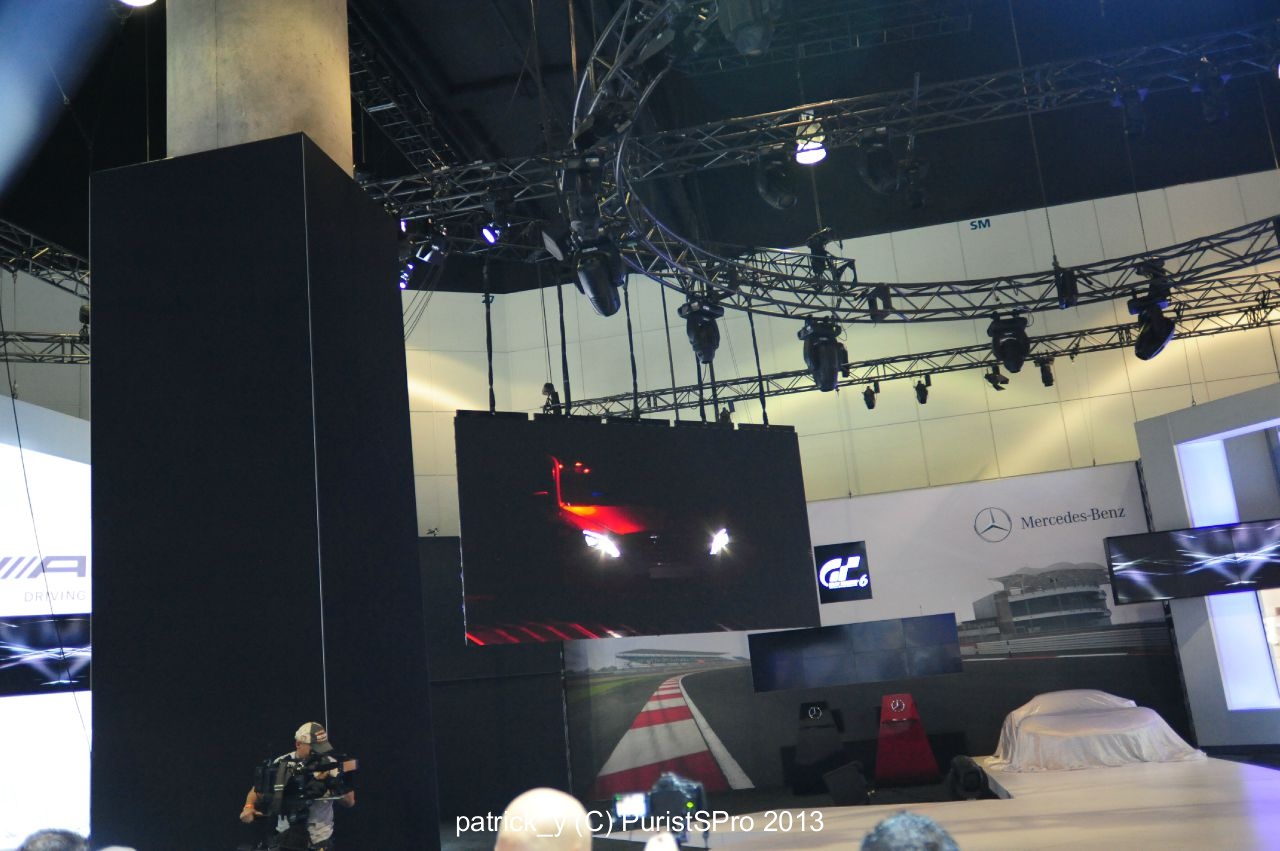 The car drives itself onto the Frankfurt Auto Show stage in front of press.