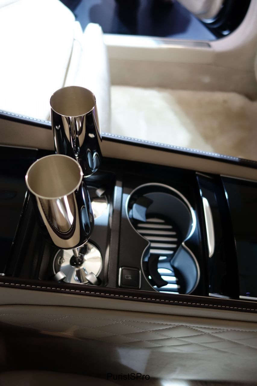 Champagne flutes. Cupholders have temperature control.