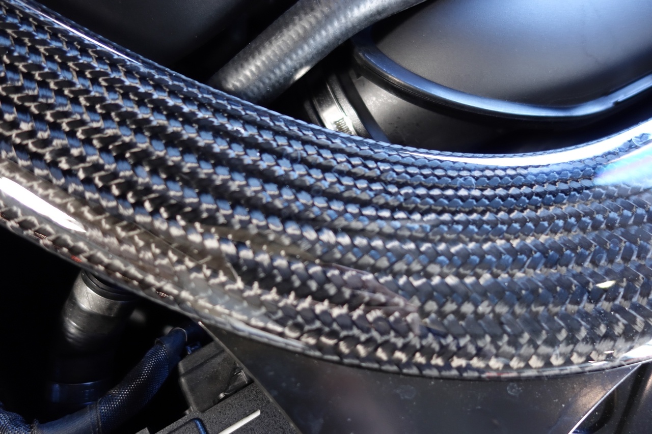 Carbon fiber strut brace for additional rigidity and safety.