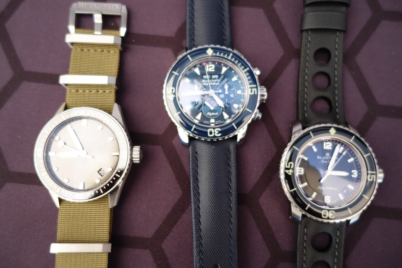 A terrible photo of three nice watches.