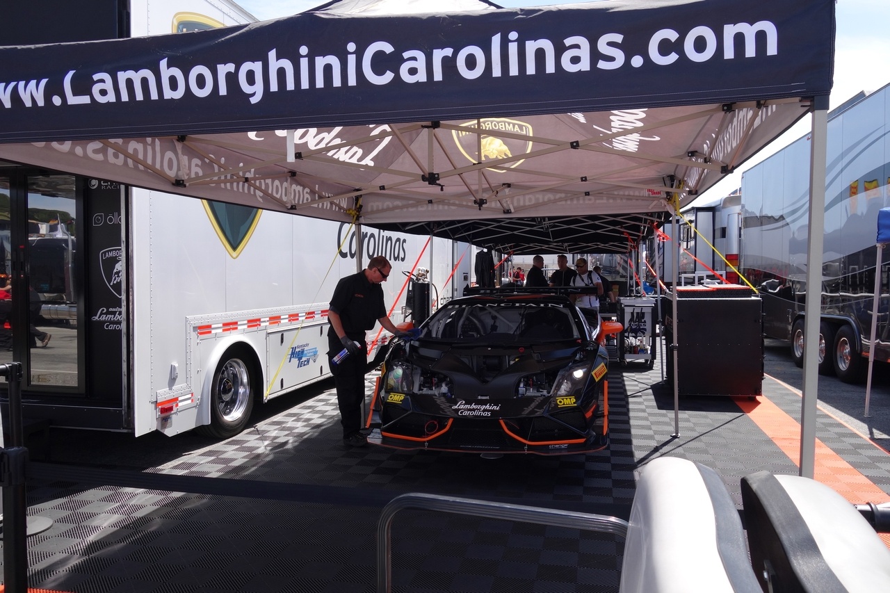 At the paddock where the car is maintained. Notice the trailer on the left.