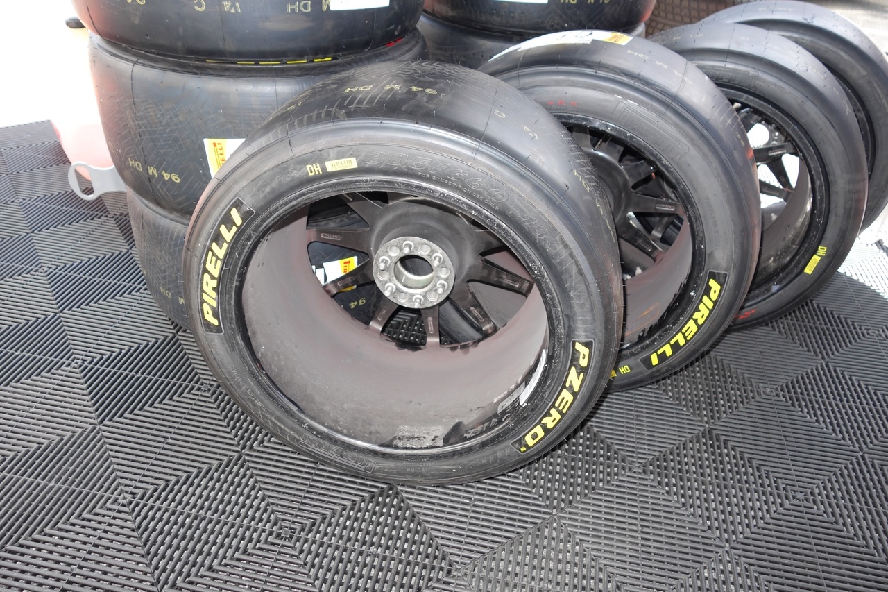 Fresh racing tires, ready to be bolted to the car.