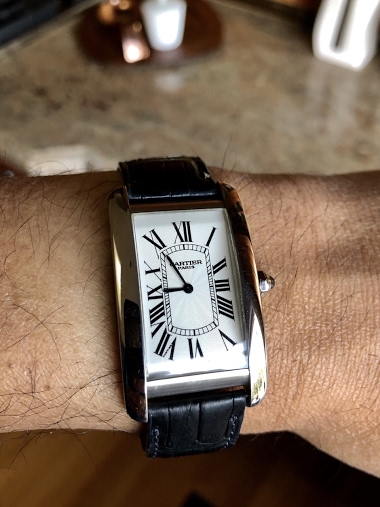 cartier tank americaine on wrist