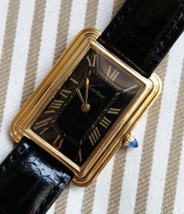 The Black Dial, Yellow Gold Cartier Tank Is A Must See