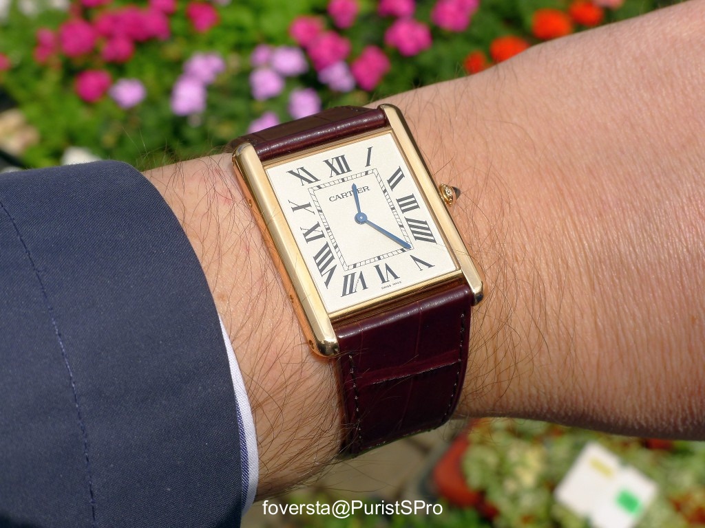 cartier tank louis on wrist